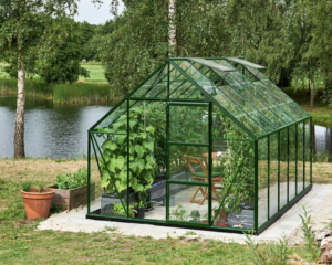 Greenhouse Halls Universal 9.9 m² with a green frame and glass